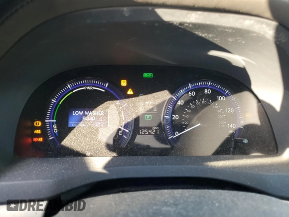 2010 Lexus HS 250h with VIN JTHBB1BA1A2017523, listed as a Copart auction lot 80086154 with 125,421 mi miles and Salvage Title. Bid and sale history available at DreamBid. Image 9.
