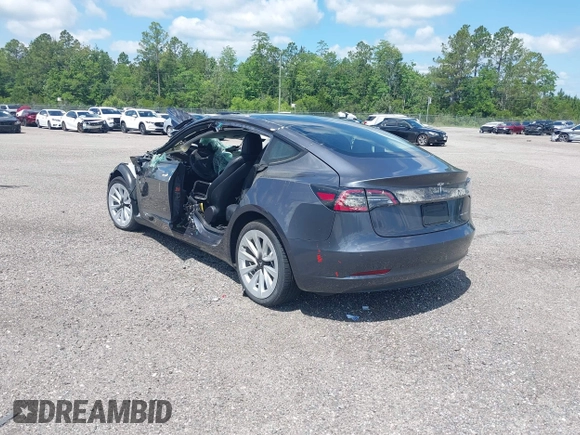 2022 Tesla Model 3 Long Range z VIN 5YJ3E1EB0NF124664, wystawiony jako IAAI lot #34246337 z przebiegiem Nie podano mil oraz . Historia ofert i sprzedaży dostępna na DreamBid. Obrazek 3.