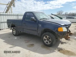 2004 Ford F-150 XL with VIN 2FTRF18W14CA74904, listed as a Copart auction lot 50361935 with 163,684 mi miles and Salvage title. Bid and sale history available at DreamBid. Image 4.