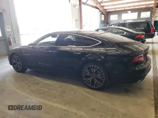 2016 Audi A7 3.0 Premium Plus with VIN WAUWGAFC5GN064672, listed as a Copart auction lot 71574044 with 64,927 mi miles and Salvage Title. Bid and sale history available at carsss.com. Image 2.