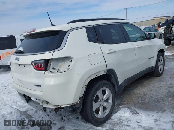 2019 Jeep Compass Latitude with VIN 3C4NJDBB0KT813014, listed as a IAAI auction lot 41560221 with 63,307 mi miles. Bid and sale history available at carsss.com. Image 4.