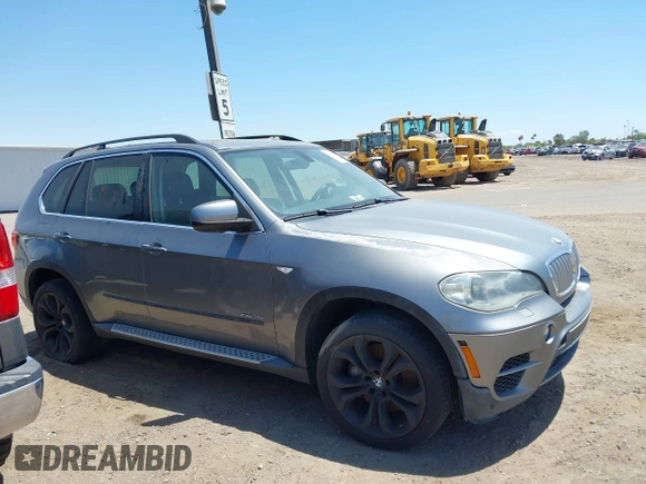 2013 BMW X5 xDrive50i with VIN 5UXZV8C56D0C15064, listed as a IAAI auction lot 42179213 with Not provided miles and . Bid and sale history available at DreamBid. Image 12.