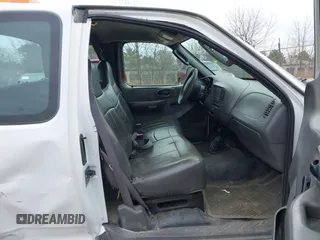 2003 Ford F-150 XL with VIN 2FTRX18W03CB12800, listed as a IAAI auction lot 41897027 with 1 mi miles. Bid and sale history available at carsss.com. Image 5.
