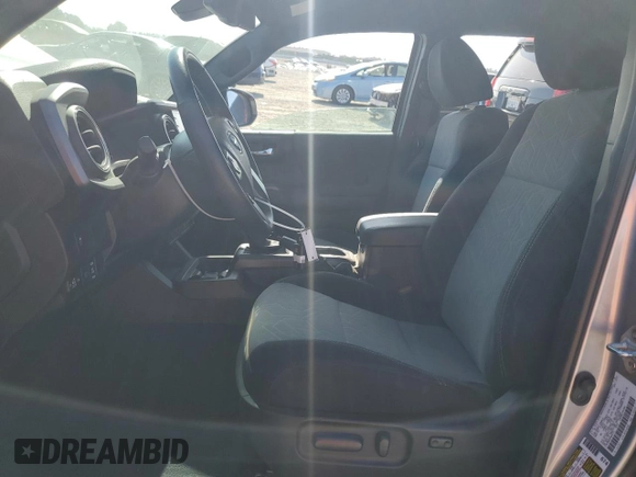 2023 Toyota Tacoma SR with VIN 3TMCZ5AN3PM645372, listed as a Copart auction lot 59917365 with 27,146 mi miles and Salvage title. Bid and sale history available at DreamBid. Image 7.