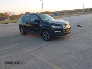 2017 Jeep Compass Latitude with VIN 3C4NJDBB8HT664781, listed as a IAAI auction lot 40670412 with 125,593 mi miles. Bid and sale history available at carsss.com. Image 1.