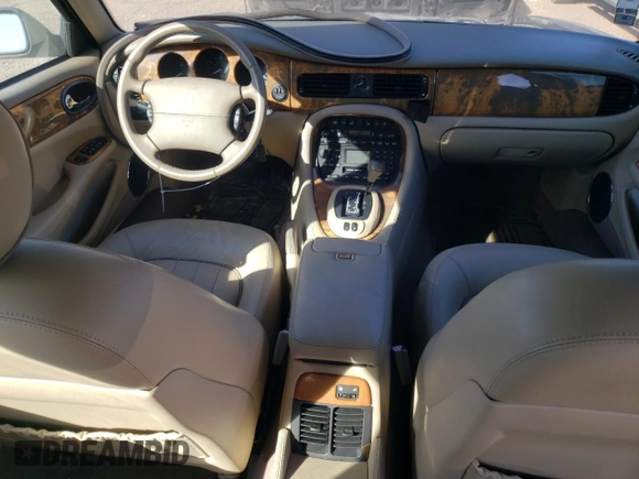 2001 Jaguar XJ with VIN SAJDA23C31LF28667, listed as a Copart auction lot 76983144 with 87,542 mi miles and Clean title. Bid and sale history available at DreamBid. Image 8.