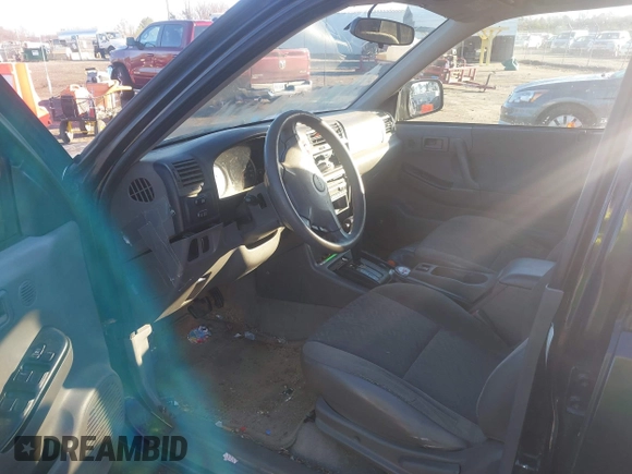 2003 Isuzu Rodeo with VIN 4S2CK58W034303195, listed as a IAAI auction lot 41219379 with 215,821 mi miles and . Bid and sale history available at DreamBid. Image 5.