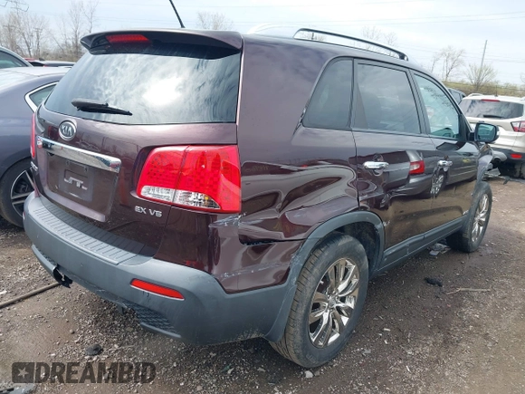 2011 Kia Sorento EX with VIN 5XYKUDA2XBG131874, listed as a IAAI auction lot 41901492 with 170,179 mi miles. Bid and sale history available at carsss.com. Image 4.