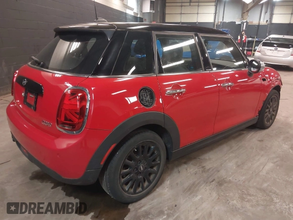 2019 MINI Hardtop 4 Door Cooper with VIN WMWXU1C57K2J02108, listed as a IAAI auction lot 42285864 with 19,383 mi miles and . Bid and sale history available at DreamBid. Image 4.