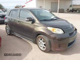 2011 Scion xD with VIN JTKKU4B45B1010646, listed as a IAAI auction lot 41603197 with 144,218 mi miles. Bid and sale history available at carsss.com. Image 1.