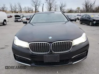 2018 BMW 7 Series 740i xDrive with VIN WBA7E4C50JGV23975, listed as a Copart auction lot 82354264 with 63,657 mi miles and Salvage Title. Bid and sale history available at carsss.com. Image 5.