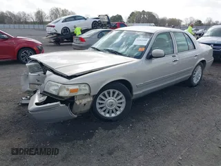 2008 Mercury Grand Marquis LS z VIN 2MEFM75V78X657966, wystawiony jako IAAI lot #41802080 z przebiegiem 113 846 mil mil oraz . Historia ofert i sprzedaży dostępna na DreamBid. Obrazek 2.