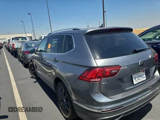 2024 Volkswagen Tiguan SE with VIN 3VV3B7AX1RM108036, listed as a IAAI auction lot 42796415 with 37,805 mi miles and . Bid and sale history available at DreamBid. Image 57.