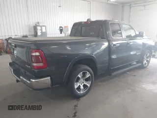 2020 Ram 1500 Laramie with VIN 1C6SRFDT7LN142009, listed as a IAAI auction lot 42330341 with 108,351 mi miles and . Bid and sale history available at DreamBid. Image 4.