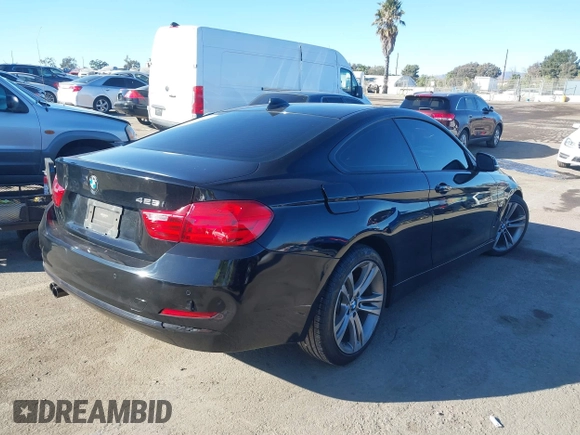 2014 BMW 4 Series 428i with VIN WBA3N7C55EK221259, listed as a IAAI auction lot 41322781 with 100,274 mi miles and . Bid and sale history available at carsss.com. Image 4.