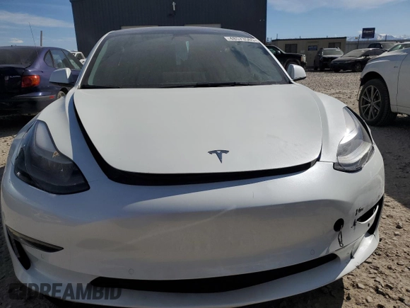 2022 Tesla Model 3 Long Range with VIN 5YJ3E1EB4NF317528, listed as a Copart auction lot 48573565 with 30,541 mi miles and Salvage Title. Bid and sale history available at carsss.com. Image 5.