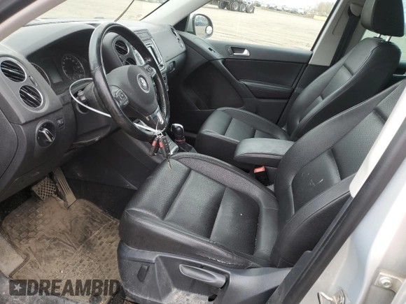 2013 Volkswagen Tiguan S with VIN WVGJV3AX0DW561431, listed as a Copart auction lot 55918795 with 246,907 mi miles and Salvage title. Bid and sale history available at DreamBid. Image 7.