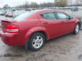 2009 Dodge Avenger SXT with VIN 1B3LC56BX9N523621, listed as a IAAI auction lot 41068673 with 174,055 mi miles. Bid and sale history available at carsss.com. Image 4.