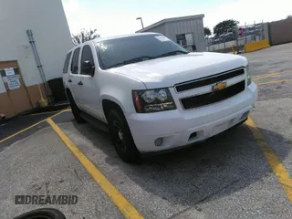 2011 Chevrolet Tahoe Commercial with VIN 1GNLC2E02BR325621, listed as a IAAI auction lot 41866389 with 167,693 mi miles and . Bid and sale history available at DreamBid. Image 1.