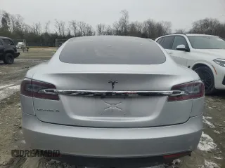 2013 Tesla Model S with VIN 5YJSA1AC9DFP10705, listed as a Copart auction lot 89394665 with Not Provided miles and Salvage Title. Bid and sale history available at carsss.com. Image 6.