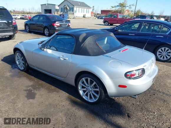 2007 Mazda MX-5 Miata Sport z VIN JM1NC25F170135777, wystawiony jako IAAI lot #41746586 z przebiegiem 107 302 mil mil oraz . Historia ofert i sprzedaży dostępna na DreamBid. Obrazek 3.