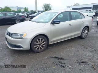 2013 Volkswagen Jetta SE z VIN 3VWDP7AJ9DM213171, wystawiony jako IAAI lot #42278515 z przebiegiem 146 386 mil mil oraz . Historia ofert i sprzedaży dostępna na DreamBid. Obrazek 2.