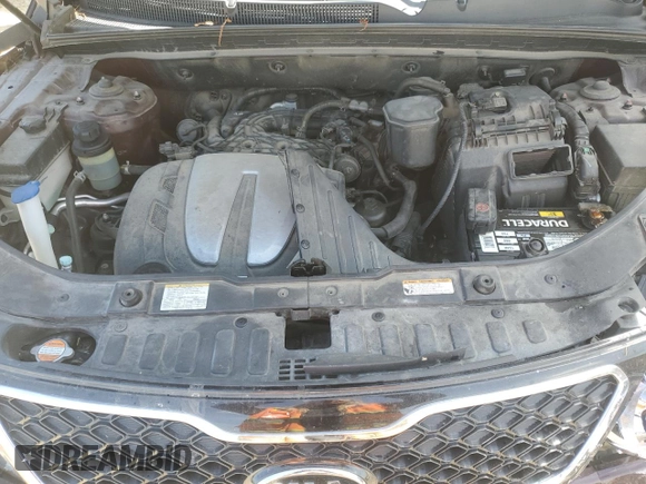 2012 Kia Sorento SX z VIN 5XYKWDA29CG301363, wystawiony jako Copart lot #55954815 z przebiegiem 83 206 mil mil oraz Szkoda całkowita • Salvage title. Historia ofert i sprzedaży dostępna na DreamBid. Obrazek 12.