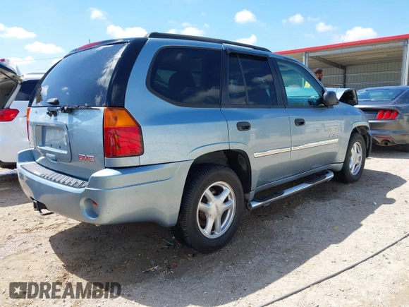 2006 GMC Envoy SLE with VIN 1GKDS13S362310613, listed as a IAAI auction lot 41881880 with 202,893 mi miles. Bid and sale history available at carsss.com. Image 4.