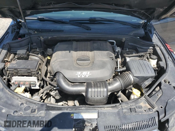 2013 Dodge Durango SXT with VIN 1C4RDJAG3DC575923, listed as a Copart auction lot 60100195 with 211,606 mi miles and Salvage title. Bid and sale history available at DreamBid. Image 12.
