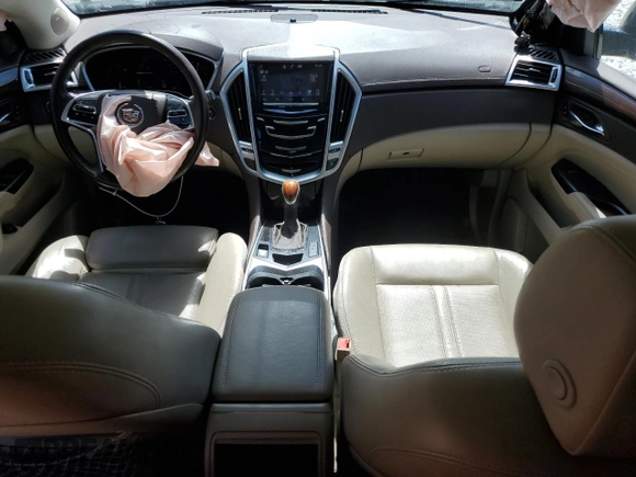 2016 Cadillac SRX Luxury Collection with VIN 3GYFNBE37GS523443, listed as a Copart auction lot 60421285 with 71,148 mi miles and Salvage title. Bid and sale history available at DreamBid. Image 8.