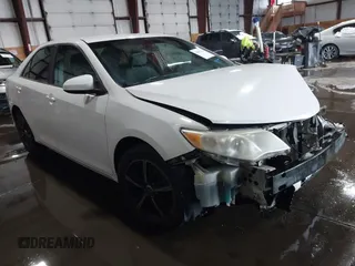 2014 Toyota Camry L with VIN 4T1BF1FKXEU306754, listed as a IAAI auction lot 41613218 with 195,692 mi miles. Bid and sale history available at carsss.com. Image 1.