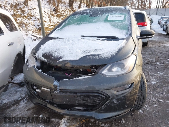 2021 Chevrolet Bolt EV Premier z VIN 1G1FZ6S09M4113694, wystawiony jako IAAI lot #41378289 z przebiegiem 40 979 mil mil oraz . Historia ofert i sprzedaży dostępna na DreamBid. Obrazek 6.