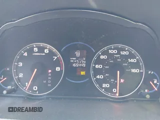 2004 Acura TSX w/Navigation z VIN JH4CL96934C023631, wystawiony jako IAAI lot #41993059 z przebiegiem 165 449 mil mil oraz . Historia ofert i sprzedaży dostępna na DreamBid. Obrazek 7.