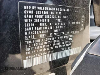 2013 Volkswagen Tiguan SE z VIN WVGAV7AX4DW523112, wystawiony jako Copart lot #53261855 z przebiegiem 86 190 mil mil oraz Szkoda całkowita • Salvage title. Historia ofert i sprzedaży dostępna na DreamBid. Obrazek 13.