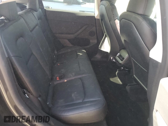 2024 Tesla Model Y with VIN 7SAYGDED0RF125308, listed as a Copart auction lot 61614675 with 11,608 mi miles and Salvage title. Bid and sale history available at DreamBid. Image 11.