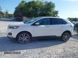 2019 Ford Edge Titanium with VIN 2FMPK3K95KBB34764, listed as a IAAI auction lot 42719541 with 128,028 mi miles and . Bid and sale history available at DreamBid. Image 14.