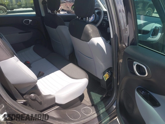 2014 FIAT 500L Easy with VIN ZFBCFABH0EZ028102, listed as a IAAI auction lot 42721149 with 115,137 mi miles and . Bid and sale history available at DreamBid. Image 8.