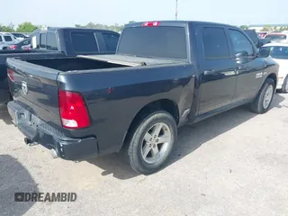 2014 Ram 1500 Express with VIN 3C6RR6KT6EG197063, listed as a IAAI auction lot 42521461 with 254,231 mi miles and . Bid and sale history available at DreamBid. Image 4.