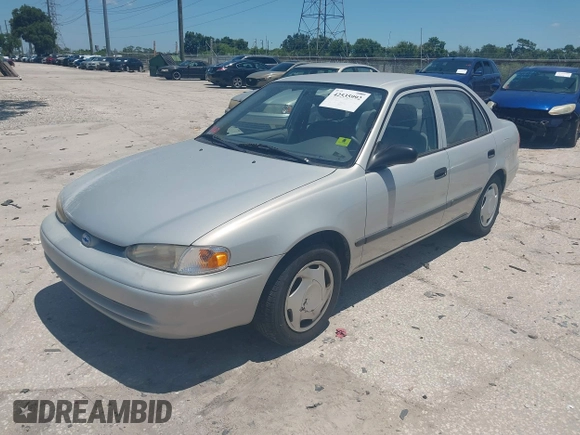 2001 Chevrolet Prizm with VIN 1Y1SK52861Z421412, listed as a IAAI auction lot 42535992 with 72,632 mi miles and . Bid and sale history available at DreamBid. Image 2.