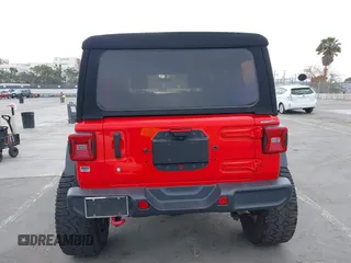 2018 Jeep Wrangler Unlimited Rubicon с VIN 1C4HJXFG4JW156506, выставлен на аукционе IAAI как лот 42246880 с пробегом 57 062 миль миль и . История ставок и продаж доступна на DreamBid. Изображение 16.
