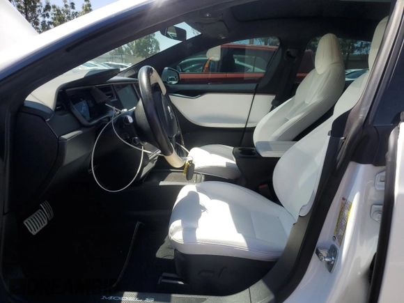2020 Tesla Model S Performance with VIN 5YJSA1E42LF401157, listed as a Copart auction lot 55082875 with 60,376 mi miles and Salvage title. Bid and sale history available at DreamBid. Image 7.