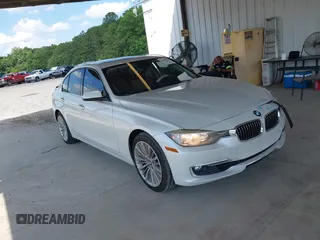 2013 BMW 3 Series 328i with VIN WBA3A5G58DNP19818, listed as a IAAI auction lot 42315026 with 133,510 mi miles and . Bid and sale history available at DreamBid. Image 1.