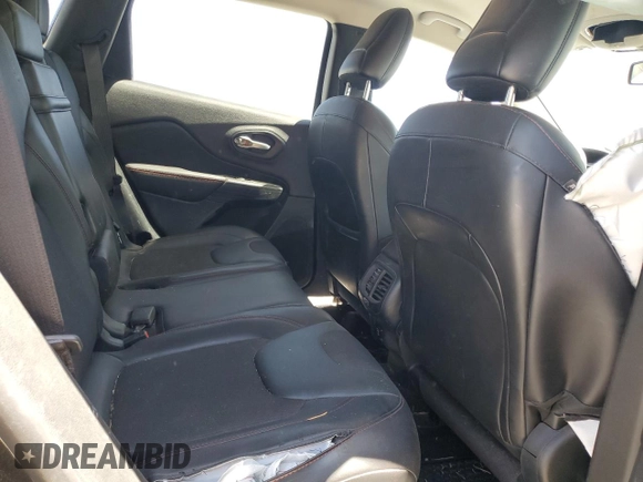 2016 Jeep Cherokee Trailhawk с VIN 1C4PJMBS8GW352316, выставлен на аукционе Copart как лот 62519365 с пробегом 128 576 миль миль и Списание • Salvage title. История ставок и продаж доступна на DreamBid. Изображение 11.