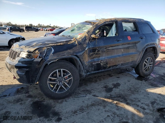 2019 Jeep Grand Cherokee Trailhawk with VIN 1C4RJFLG7KC823624, listed as a Copart auction lot 88843075 with 102,997 mi miles and Salvage Title. Bid and sale history available at carsss.com. Image 1.