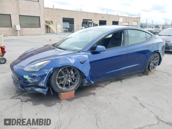 2021 Tesla Model 3 Long Range with VIN 5YJ3E1EB6MF878411, listed as a IAAI auction lot 41986947 with 71,978 mi miles and . Bid and sale history available at DreamBid. Image 21.