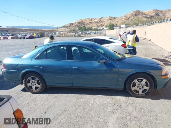2001 Lincoln LS w/Base Pkg with VIN 1LNHM87A31Y617332, listed as a IAAI auction lot 41317767 with 141,931 mi miles. Bid and sale history available at carsss.com. Image 13.