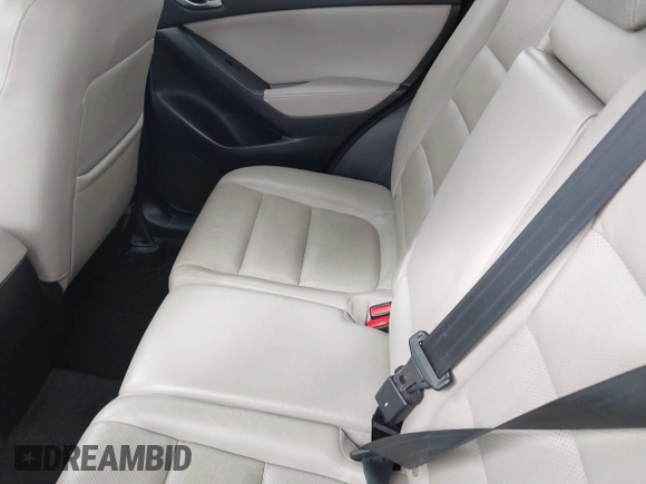 2014 Mazda CX-5 Grand Touring with VIN JM3KE2DY1E0307911, listed as a IAAI auction lot 42064898 with 133,934 mi miles. Bid and sale history available at carsss.com. Image 8.