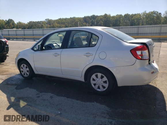 2012 Suzuki SX4 LE with VIN JS2YC5A35C6303637, listed as a Copart auction lot 71122474 with 169,761 mi miles and Salvage Title. Bid and sale history available at carsss.com. Image 2.