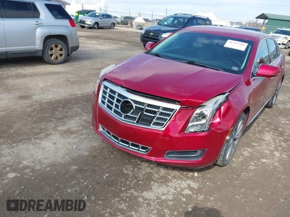 2013 Cadillac XTS z VIN 2G61N5S37D9177217, wystawiony jako IAAI lot #41747566 z przebiegiem 140 946 mil mil oraz . Historia ofert i sprzedaży dostępna na DreamBid. Obrazek 6.