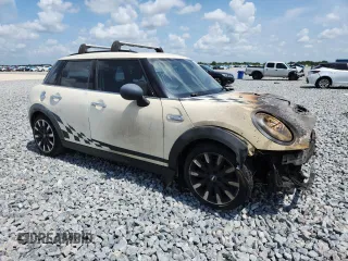 2015 MINI Hardtop 4 Door S z VIN WMWXU3C50F2B56953, wystawiony jako Copart lot #58579615 z przebiegiem Nie podano mil oraz Szkoda całkowita • Salvage title. Historia ofert i sprzedaży dostępna na DreamBid. Obrazek 4.
